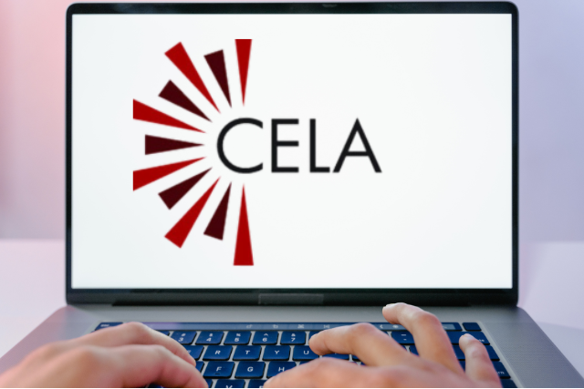 Fingers type on a laptop with the CELA logo displayed on the screen.